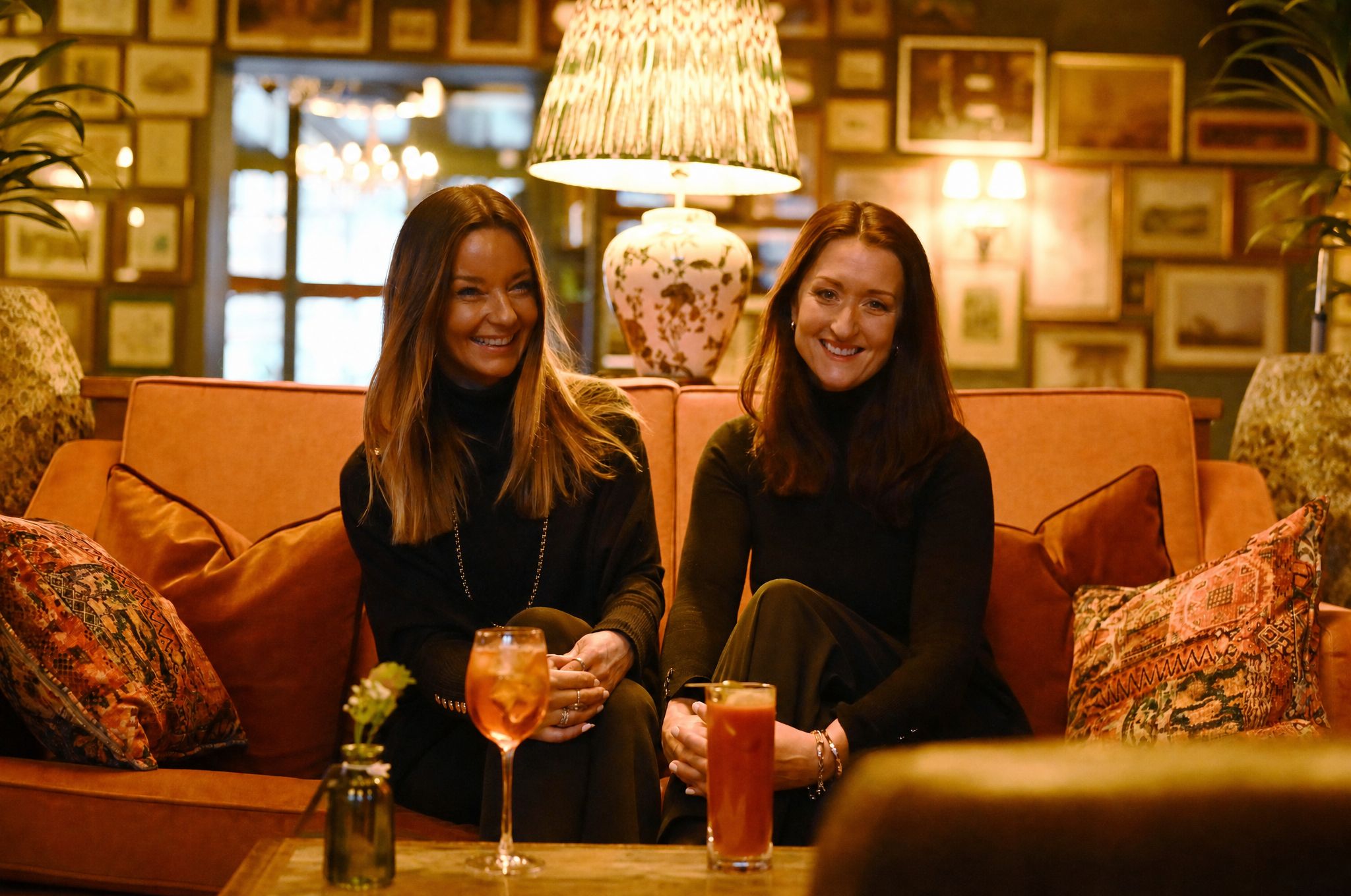 Ruth and Amy sitting on a couch
